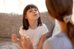 Girl imitating teacher